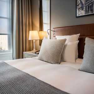 Suite met een Slaapkamer en een King Size Bed